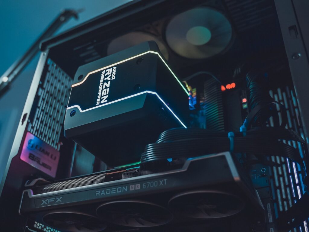 A custom PC build with a black case and blue light, showcasing a sleek design and modern aesthetics.